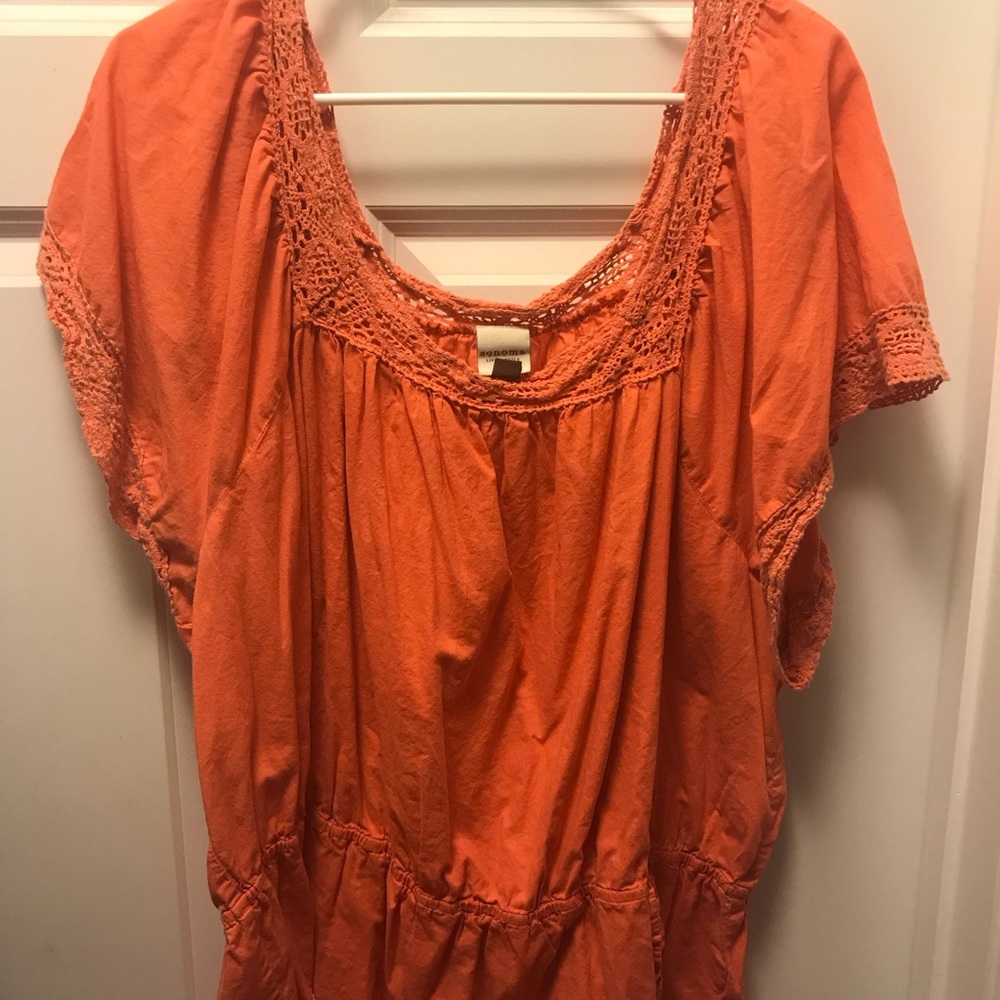 Cute orange blouse with crochet detailing